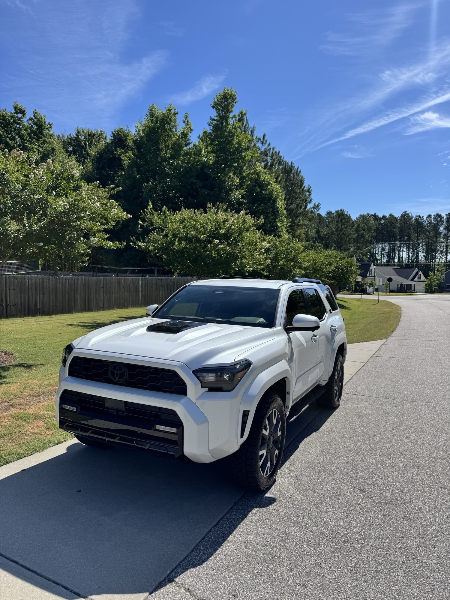 Front three-quarter view of the ceramic-coated 2026 Toyota 4Runner on a Raleigh NC driveway