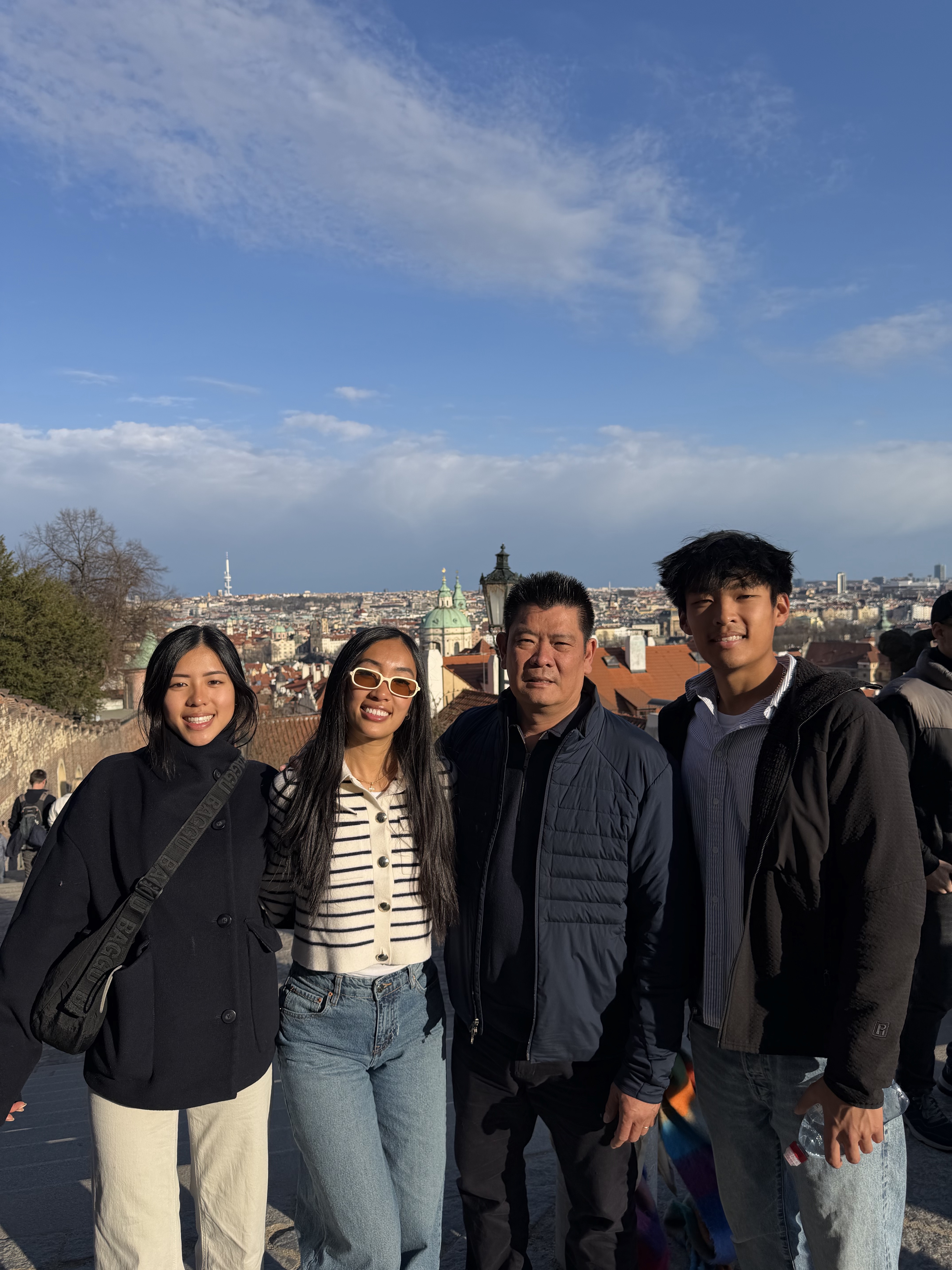 Cardin Tang, founder of Tang Detailing, with his family