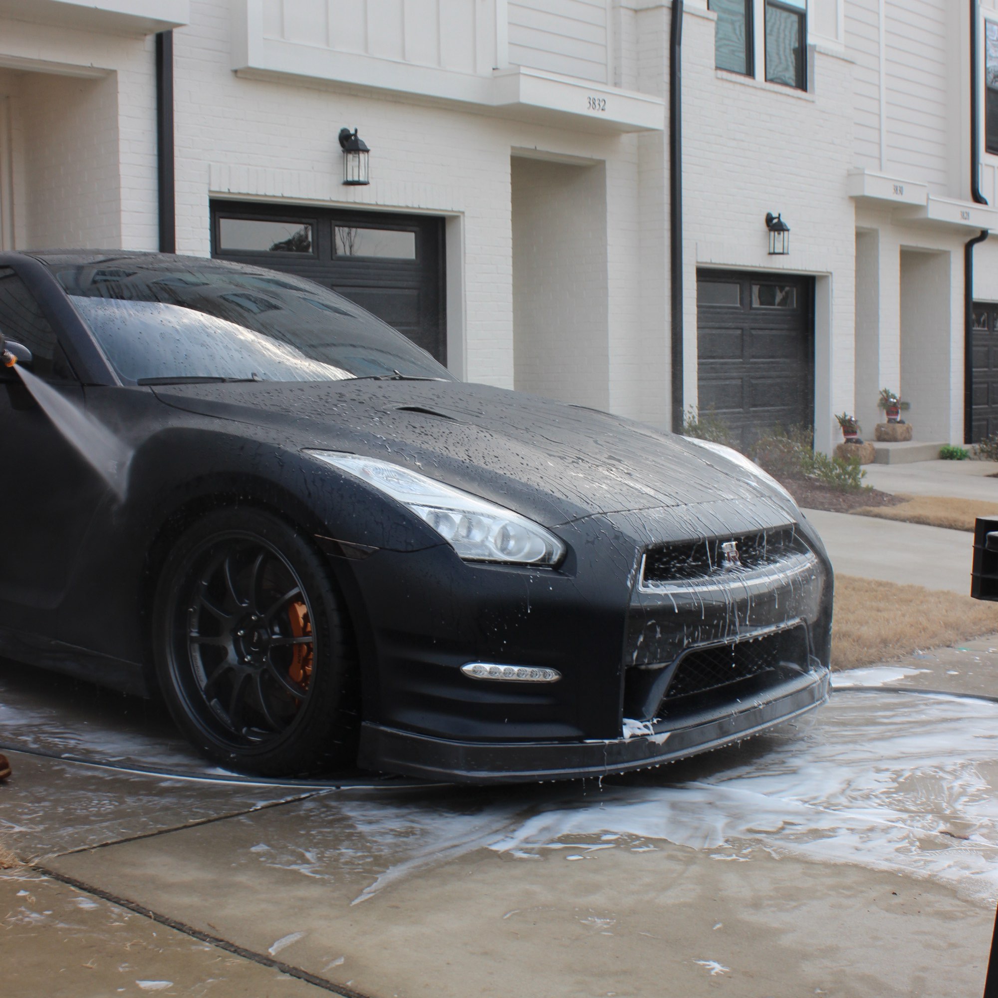 Matte black vinyl-wrapped Nissan GT-R after a full detail by Tang Detailing in Raleigh NC