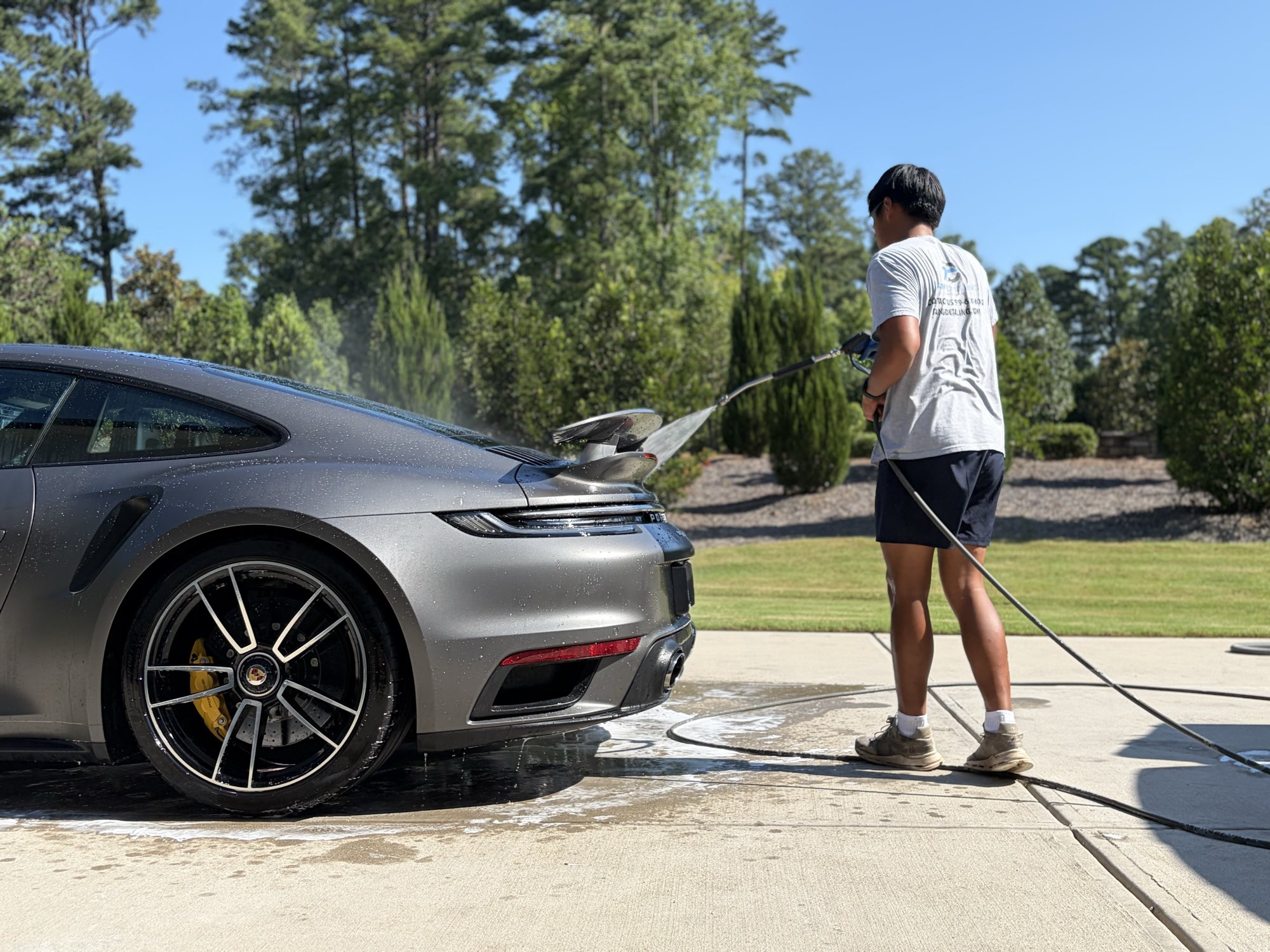 Front three-quarter of the clean Porsche 911 Turbo S after a careful hand wash in Raleigh NC