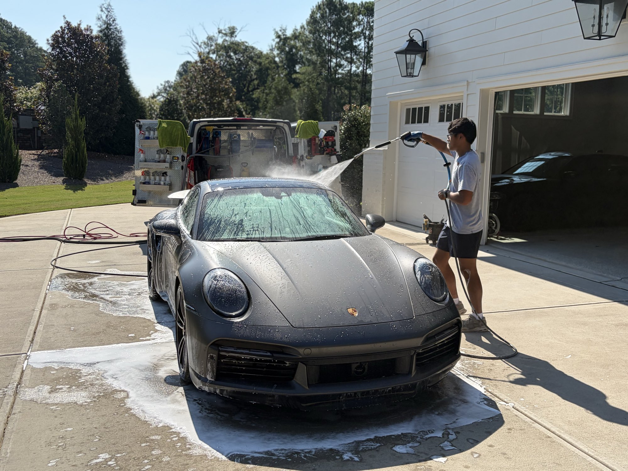 Rear of the Porsche 911 Turbo S with water spots removed and wheels fully cleaned in Raleigh NC